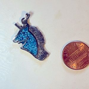 Turquoise inlaid unicorn pendant